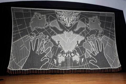 "Mundillo nuestro" (1999-200), the bobbin lace stage curtain of the Raúl Juliá-Banco Popular Theater
